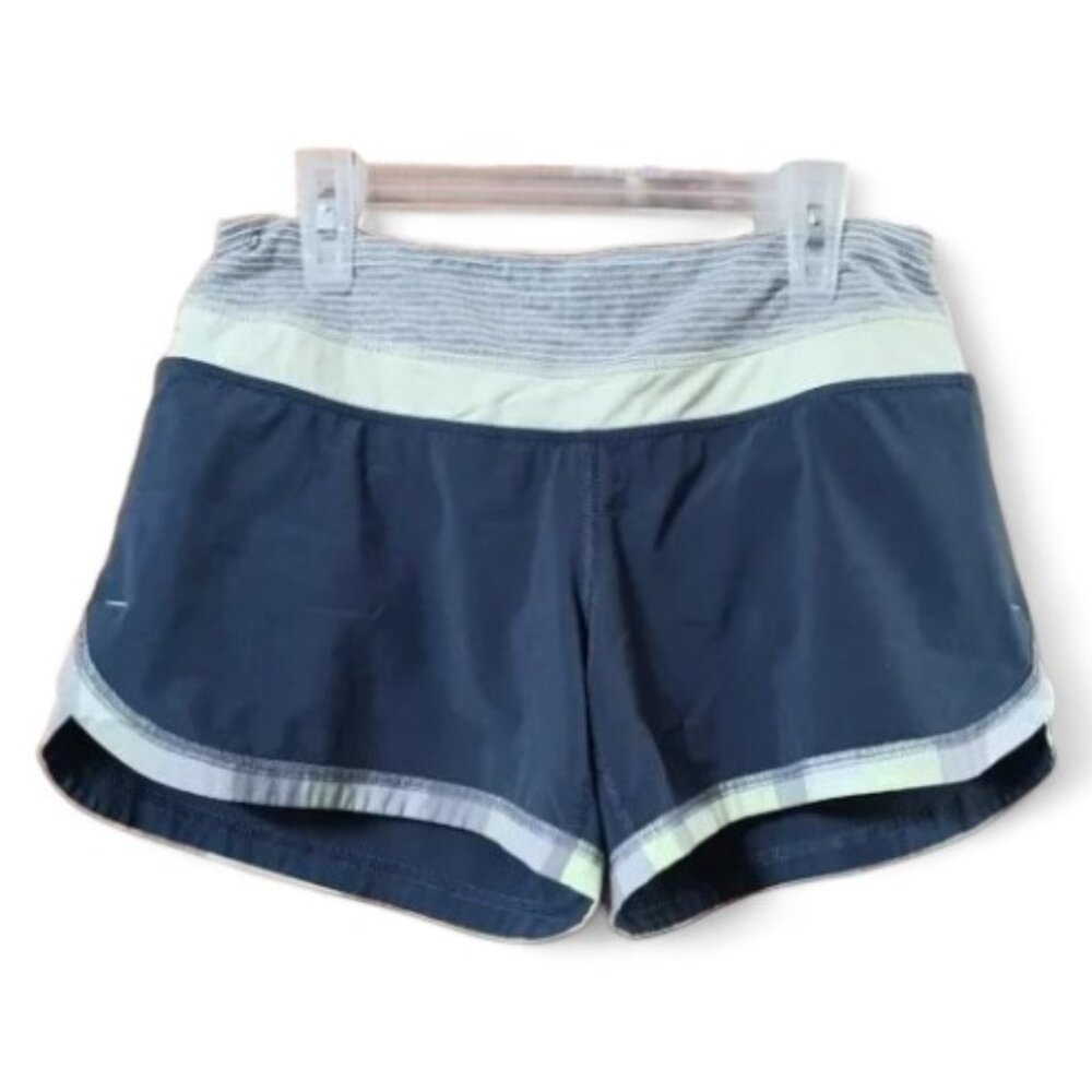 Reduced price Lululemon Wet Dry Warm  Green Neon Plaid Trim Speed Shorts  Size 4